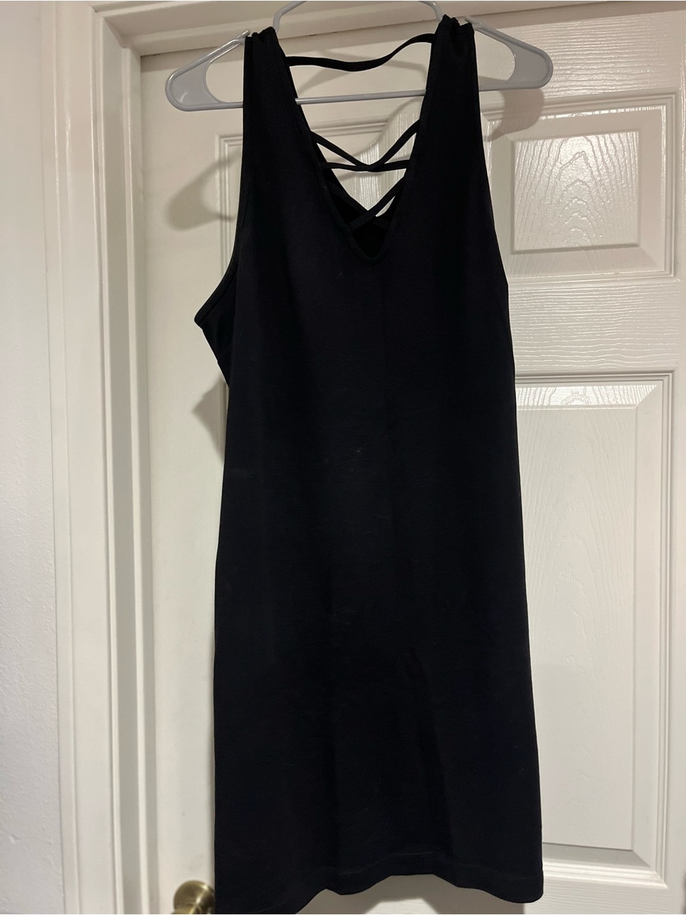 New York & Company Black Sleeveless Dress with Strappy Back with pockets.